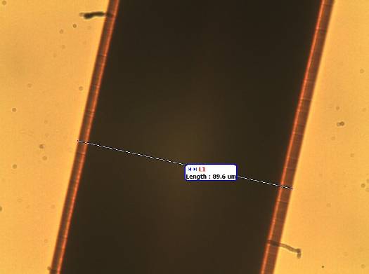 Obr. 8. Měděný drátek – objektiv 40×(naměřená hodnota 89,6 µm).